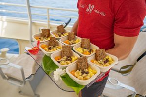 Overnight muesli, fresh local fruit, and homemade banana bread for breakfast. at Fair Wind in Kailua Kona