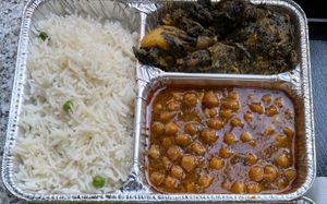 Rice with peas, spinach and potatoes, chickpeas  at Shalimar in Milan