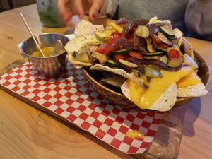 Nachos with vegan cheese and veggies at La Raiz in Barcelona