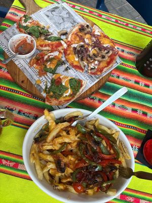 so amazing!!! they make their own vegan cheese and it’s so good, really recommend the veggie fries and pizza platter   at La Raiz in Barcelona