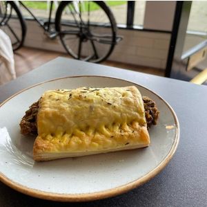 Vegan roll made bespoke for us to our own recipe. Scrumptious pastry with a filling of mushrooms and lentil with onion, celery,potatoes chestnuts apple and panko at The Hub and Spoke Cafe in Dunstable