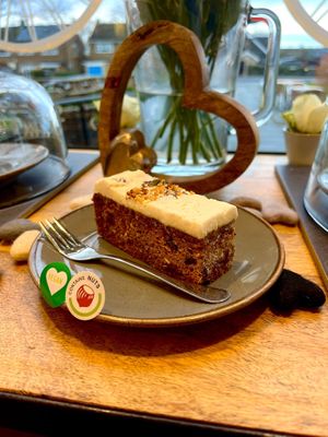 VEGAN carrot cakee  at The Hub and Spoke Cafe in Dunstable