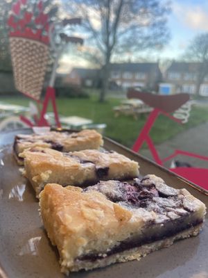 Vegan Blueberry traybake  at The Hub and Spoke Cafe in Dunstable