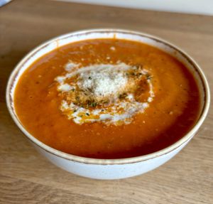 Began tomato soup with vegan ‘cream'  at The Hub and Spoke Cafe in Dunstable