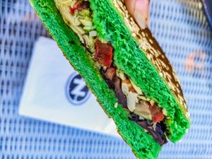 Avocado and mushrooms brioche bun at Caffè Nero in Paphos