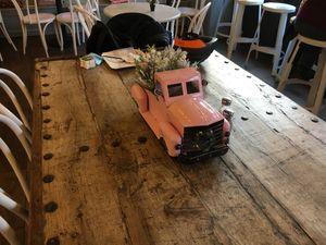 Communal table in Glow. at Glow Plant Based Revolution in New York City