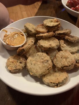 Fried pickles with vegan southwestern sauce  at Lucky's Taproom and Eatery in Dayton