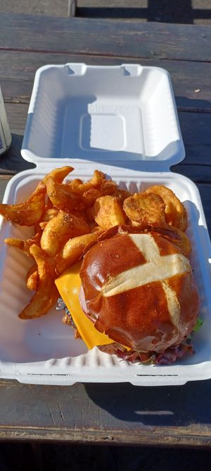 Jalapeño peppercrusted burger with fries. at The Mocking Bird in Beaverton