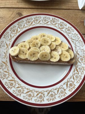 Almond butter on sourdough with maple syrup and banana    at Earthlings in Newcastle Upon Tyne