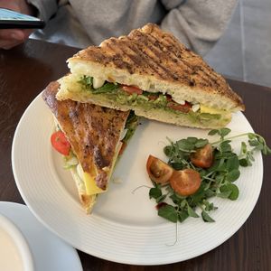 Avocado and Tomato Panini, on focaccia bread  at Imposter Cafe and Provisions  in Vancouver