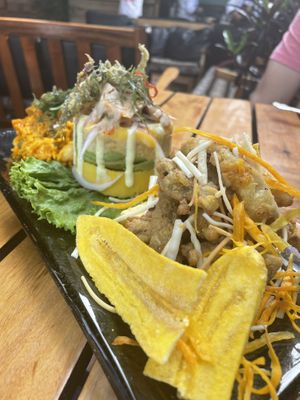 Vegan Seafood threesome! My favorite! 1) seafood rice, 2) causa + ceviche, 3) deep fried calamari-fish / chicharron de pescado. This is so refreshing and TASTY!  at Gastronomía Vegana in Lima