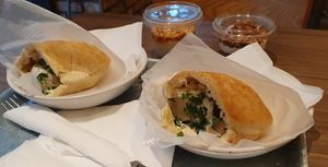 Two Falafel pitas and vegan desserts at Hummus Bar - Corvin Sétány in Budapest