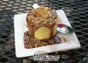 Luscious Mango Cheesecake w/chocolate sauce at PuraVegan in St Louis