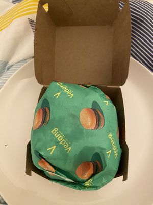 The burger was delivered wrapped  at Vedang - green burger | P- Berg in Berlin