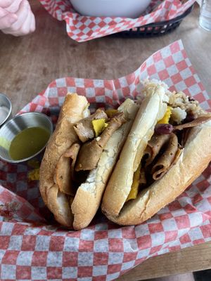 Breakfast sandwich which came with eggs, egg yolk, ham, mayonnaise and tomato’s. (The eggs, egg yolk, and ham are made in house and very good)  at Frenchmen Street Food in Gainesville