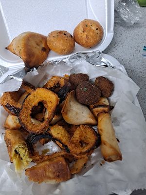 I'm not sure what the circular dark brown things were but they were extremely dry and tasted like they absorbed flavor from the inside of a refrigerator at Naan Boti Chai Shai in St Petersburg