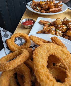 Poutine and onion rings at No Forks Given in Ottawa