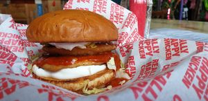 Piri piri homemade burger at Really Happy Chicken at Vaulty Towers in South East London