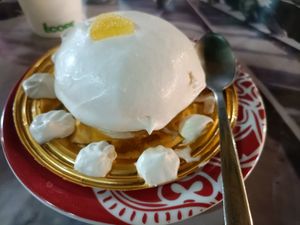 Desiderio, a dessert with a strong and lovely lemon flavour, a creamy outer layer, sponge cake and an heart of lemon cream at Romeo Peluso in Pompei