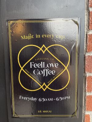 Logo and hours at the front door at FeelLove Coffee in Loveland