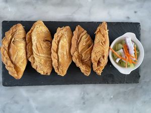 Curry puffs  at Charm Thai Bistro in Oakland