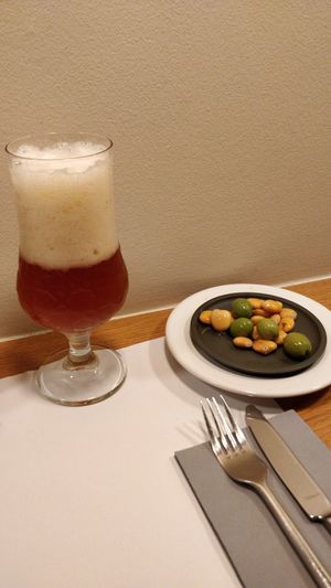 House beer (I poured it badly) and offered snack at Copenhagen in Valencia