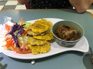 Vegan pepper steak, plantains, and salad at Eileens Kitchen  in San Juan