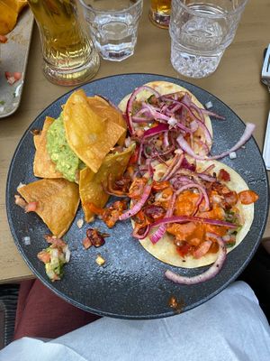 Tofu and vegetable tacos. Comes with a side of chips and guac.
There is usually 3 tacos in a portion but I ate one before the photo at Arriba Burrito in Montreal