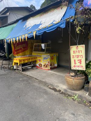 Front of shop. Sign says 50 meters that way but walked whole street and can’t find it   at Surat Thani Jae in Surat Thani