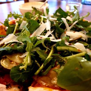 a salad on top at Jigu Curry 지구커리 in Seoul