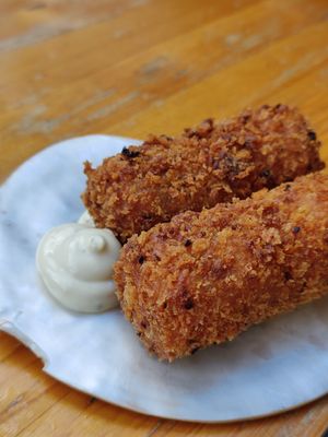 Croquettes - cassava and Warrigal greens, saltbush 
chimichurri aioli at Big Esso in Melbourne