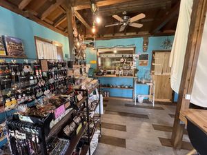 The service window and inside the cafe  at Koya - こや in Yomitan