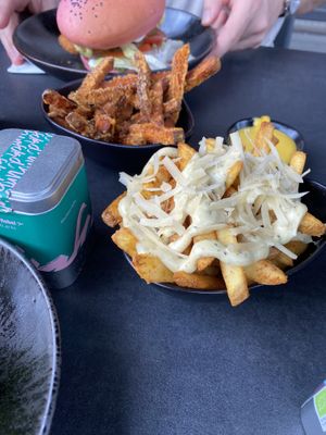 Vegan truffle fries + vegan cheese sauce   at Unfckd in Berlin