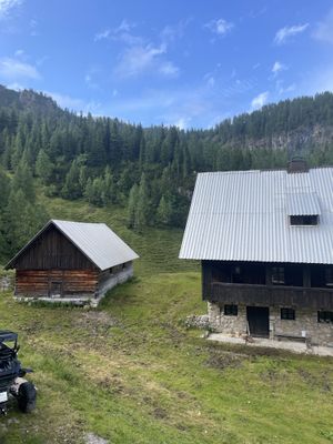 Two of the huts at this location. A restaurant hut and additional huts for accommodations.  at Krekova koča na Ratitovcu in Torka