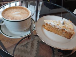 Cappuccino (3.90€) + carrot cake (3.30€) at Café Lux in Leipzig