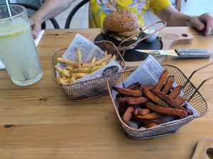 Normal and sweet potato fries and black bean burger at Flavours Spot in Setubal
