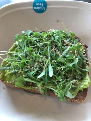Smashed avocado toast with GF multigrain bread (Avocado, microgreens, spicy agave, everything seasoning)  at Evexia in Aurora
