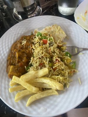 Veg chuleta with vegetable rice  at Curry 'n' Grill House in Tenerife