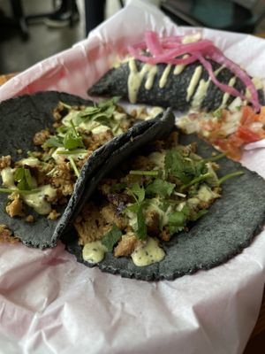 Cilantro Limon Tacos with an Elote Empanada.   at Mis Tacones in Portland