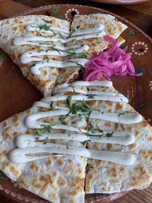 Al Pastor Quesadilla: More protein, less cheesy than typical tex-mex, great flavors. Pickled onions on side.   at Mis Tacones in Portland