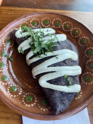 Elote empanada 😋 Not pictured: Chips n guac, perfectly seasoned. Love these plates!   at Mis Tacones in Portland