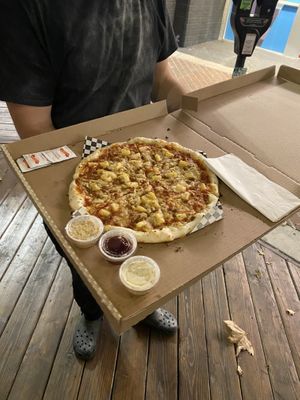 Bacon and pineapple pizza vegan gluten-free at Secret Vegan Pizza in Los Angeles