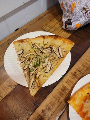 Mushroom slice at Secret Vegan Pizza in Los Angeles