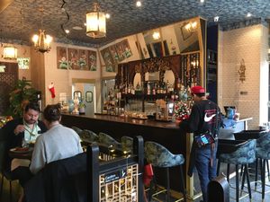 Bar and seats inside at Wau in New York City