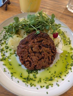 Beetroot tofu patty with Viennese potato salad at Dosa Dosa in Prague