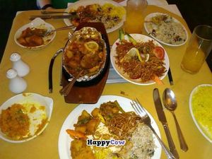 All day Sunday Special £10.95 (2 x starters - not shown; 2 x main courses; 2 x side dishes; 2 x rice or bread) at Gurkha Chef in Hastings