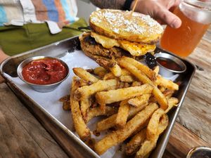 Jambo- chicken breakfast sando on french toast with fried vegan egg and plantain bacon. Amazing at Eris Food Co in Oceanside