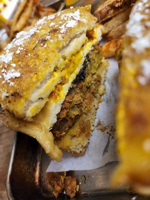 Jambi chicken breakfast sando with fried vegan egg and plantain bacon at Eris Food Co in Oceanside