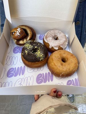cinnamon bun and 3 x doughnuts  at Bun and Coffee in Malaga