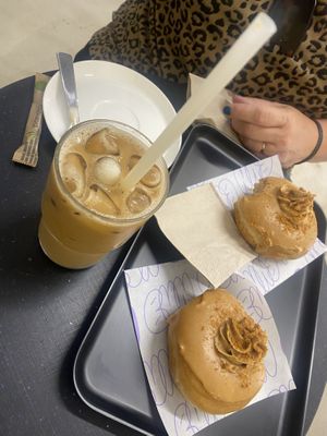 Iced Oat Latte and Biscoff Doughnut   at Bun and Coffee in Malaga